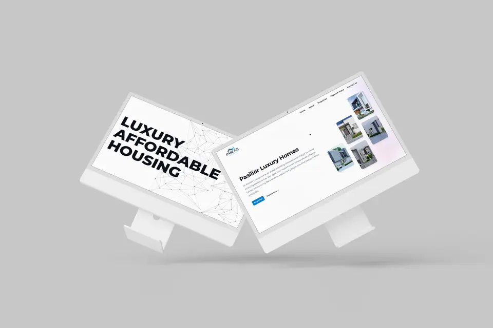 Two iMacs showing Luxury Affordable Housing and an about page for Pasilier.